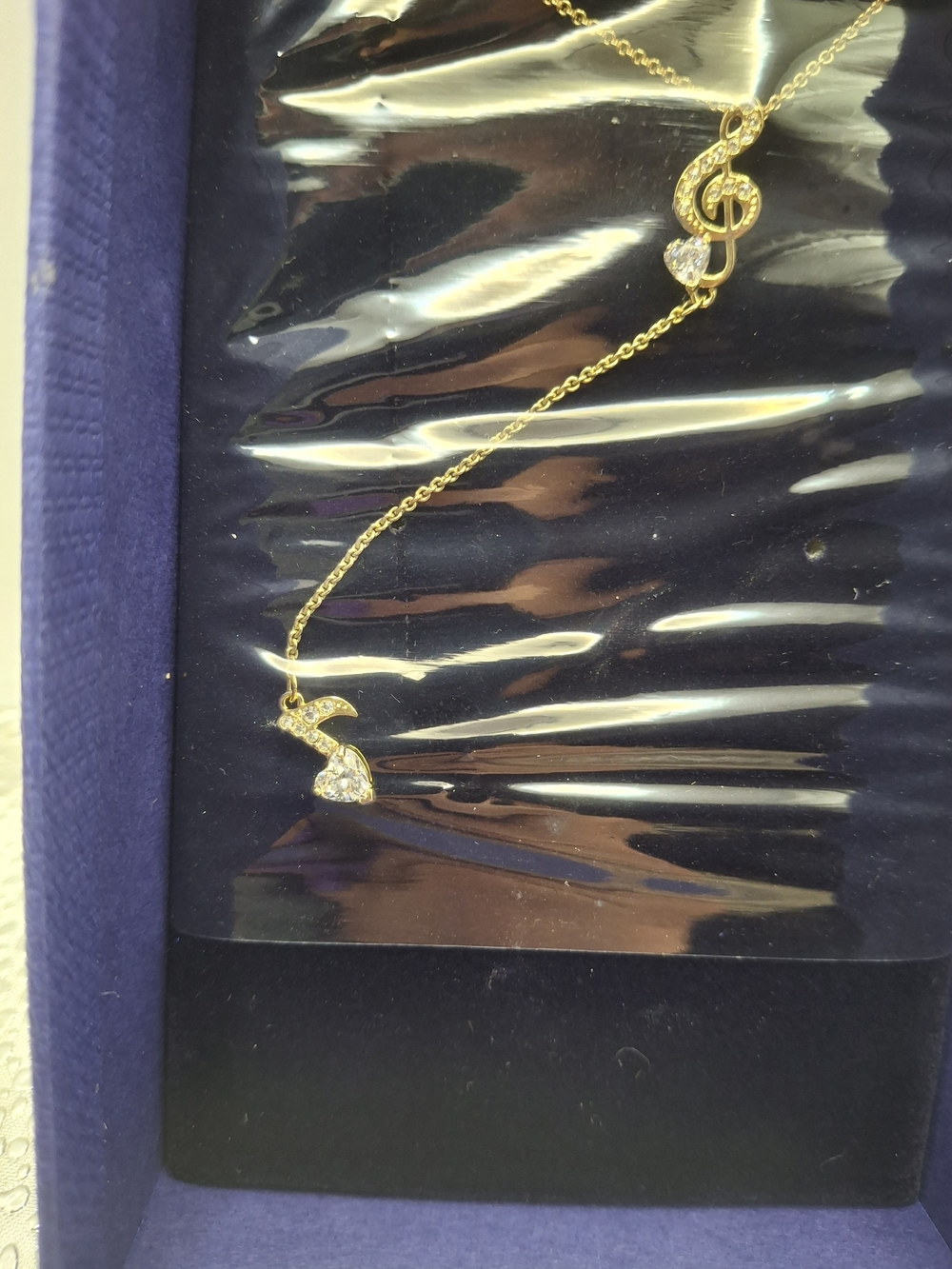 Swarovski Gold-Tone Musical Note Pendant Necklace with Clear Stones